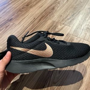 Nike black and rose gold tanjun sneaker